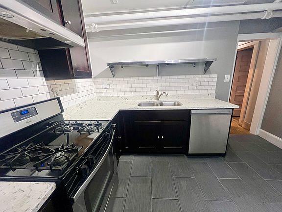 stainless steel shelving over sink