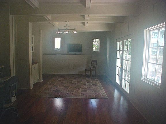 Downstairs familyroom all wood with coffered ceiling.