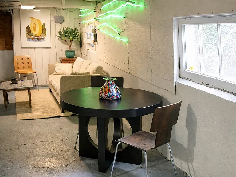 Daylight Basement with loads of storage space, media, shop space