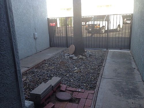 Front courtyard is enclosed with gate