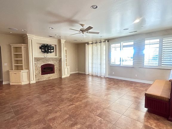 Large Living room area.
joins the kitchen area connected by custom built sitting area and kitchen island.