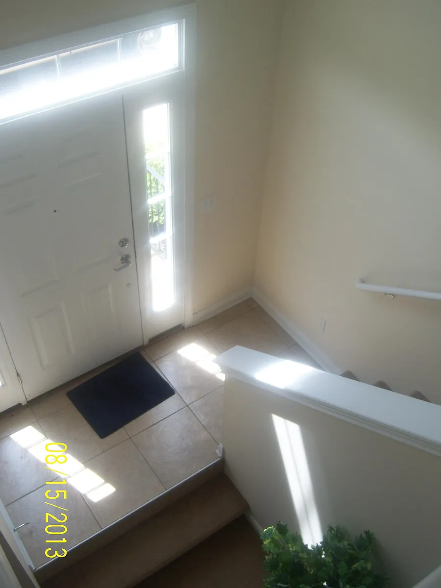Staircase/Foyer taken from the 2nd floor main living room area - 117 Clancey St
