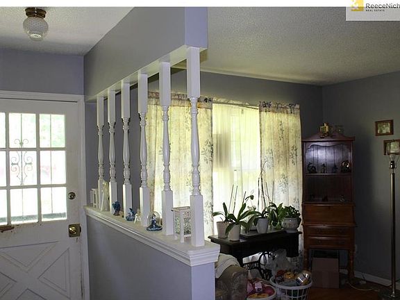 Front entry and formal dining room.