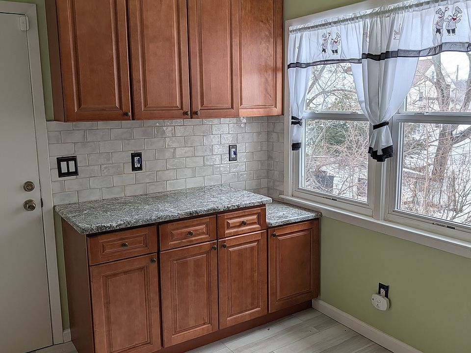 kitchen and door that leads to back stairwell