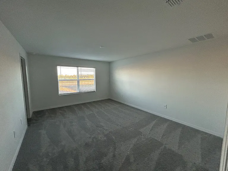 Master bedroom with large walk-in closet