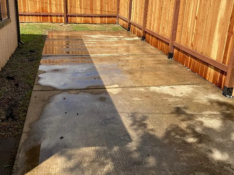 New enclosed backyard with patio.