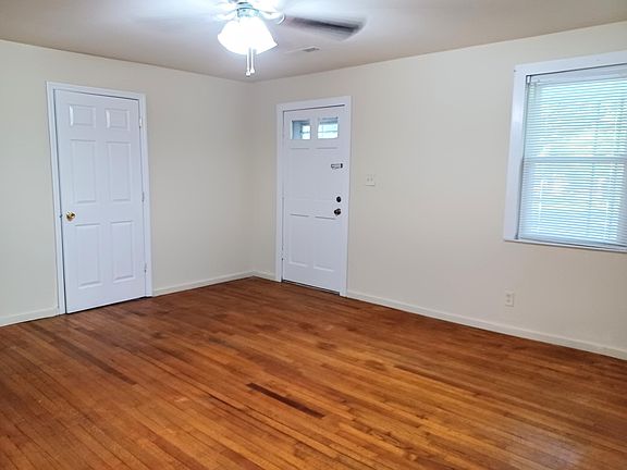 Living room has original oak hardwood floors