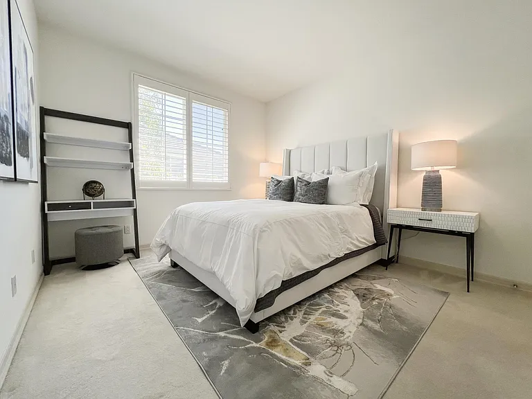 Bedroom 2 Suite with desk, renovated ensuite bath with dual vanity