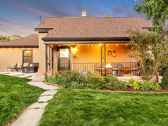 Side porch with outdoor lighting.
