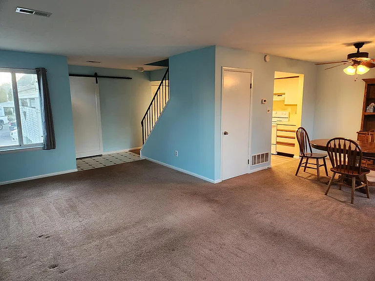 Downstairs living, dining and kitchen