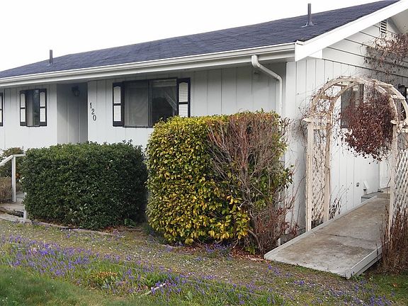 The main entry is mid-picture, and the ramp on right leads to back door into kitchen. 