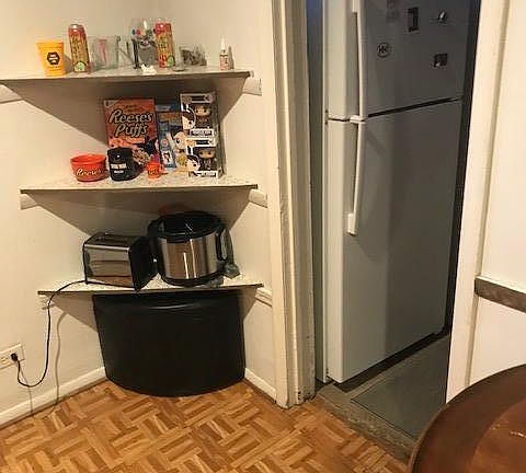 Kitchen view into pantry