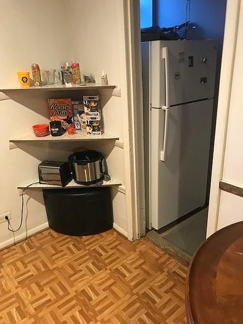 Kitchen view into pantry