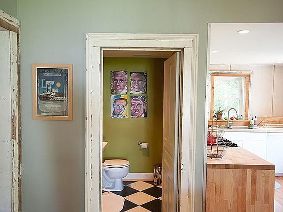 Half bath adjacent to the kitchen