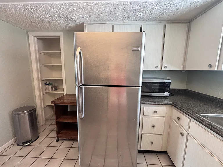 View including pantry and microwave