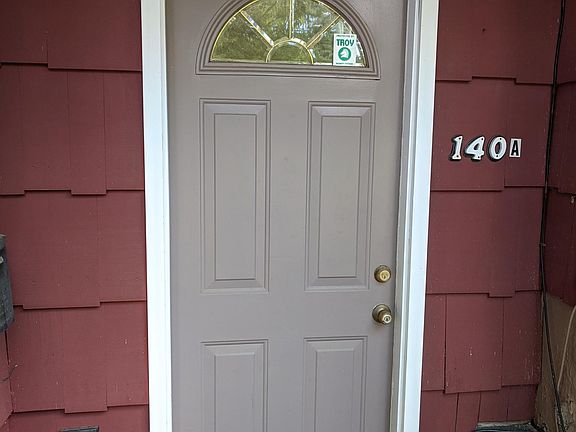 Entrance from Driveway to Foyer.