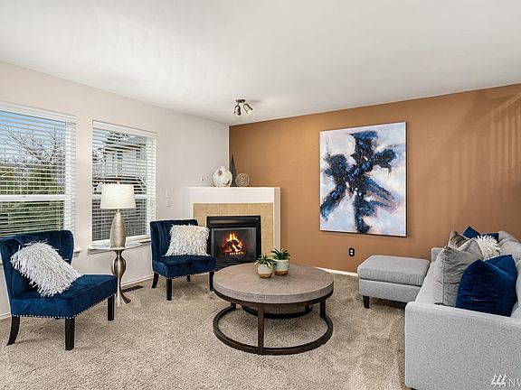 Comfortable living room with natural gas fireplace.