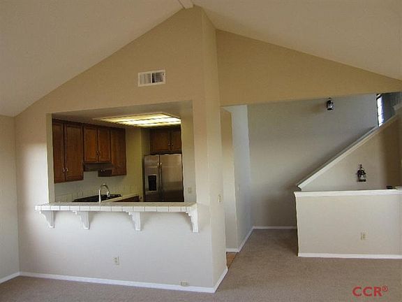 Looking into kitchen and hall from patio slider