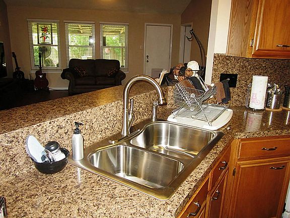 Gorgeous Updated Counter Tops, Sink, and Faucet.