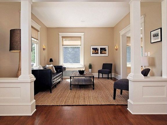 entrance from entry into living room with amazing woodwork throughout