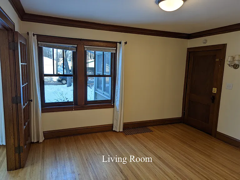 Living room looking north, hardwood floors throughout