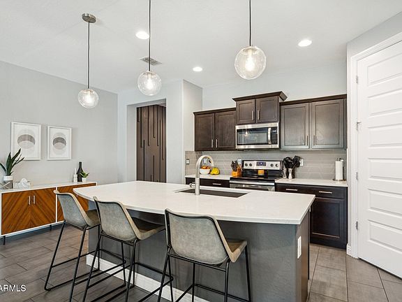 5th image of 10915 E TRAVERTINE Avenue