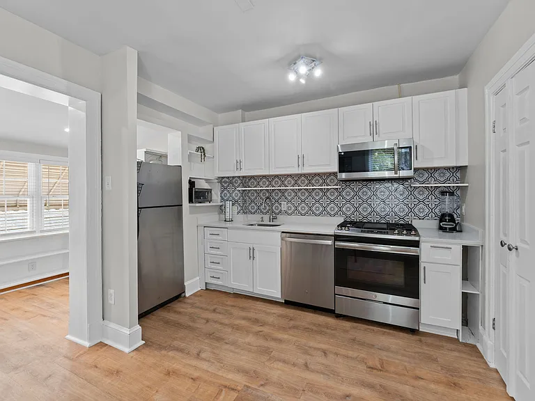 Renovated kitchen with stainless steel appliances