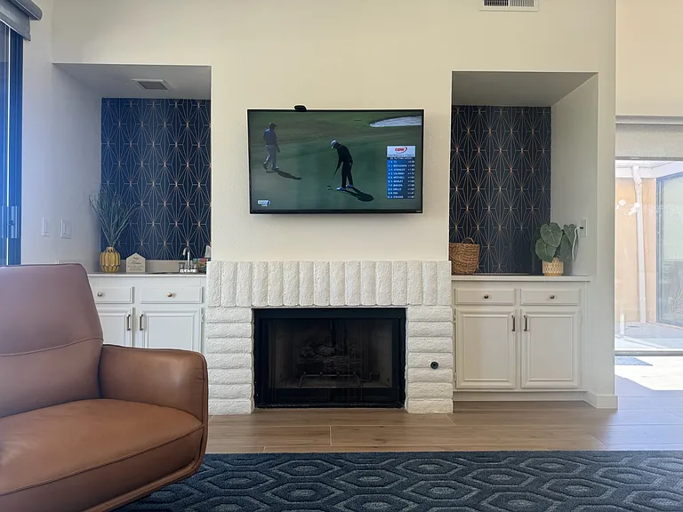 Large flat screen TV, on adjustable mount