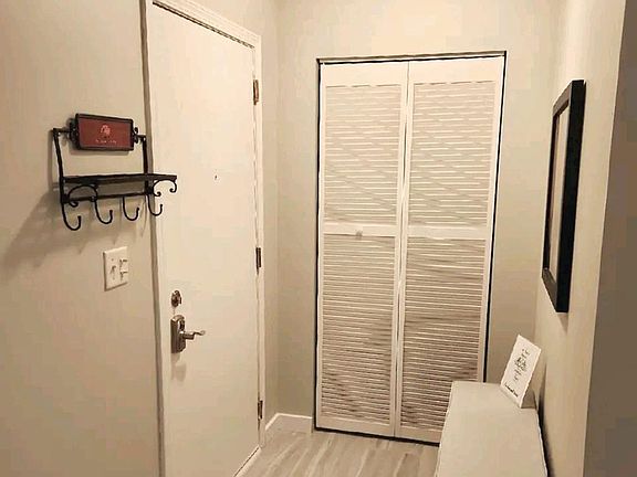 Entry way with storage closet