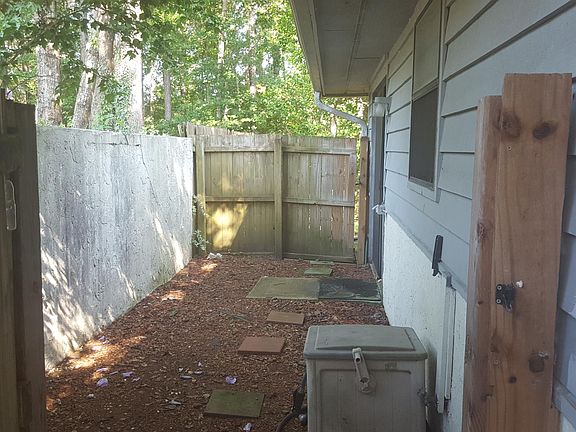 Side yard entered into from courtyard in front of home.