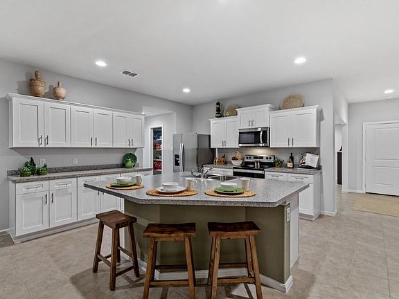 Kitchen - All Home and community information, including pricing, included features, terms, availability and amenities, are subject to change at any time without notice or obligation. All Drawings, pictures, photographs, video, square footages, floor plans, elevations, features, colors and sizes are approximate for illustration purposes only and will vary from the homes as built.