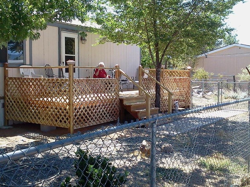 Front of Mobil Home with spacious Redwood Deck