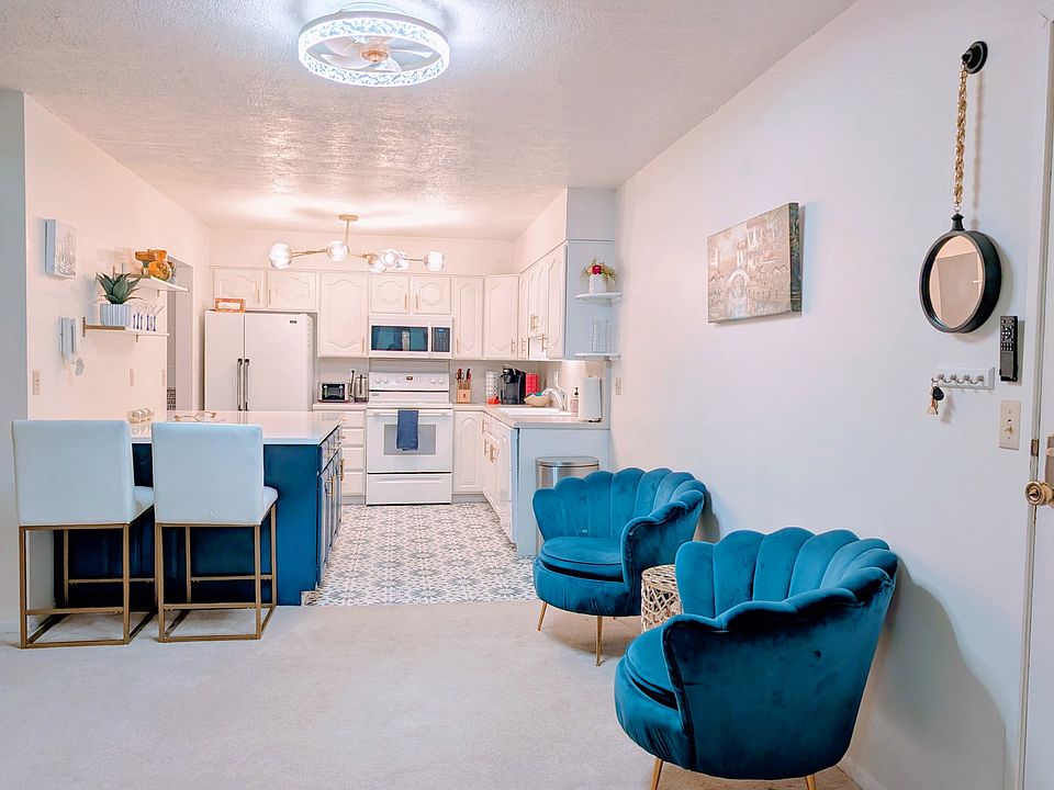 Large kitchen with upgraded lighting and new dishwasher, microwave and stove.