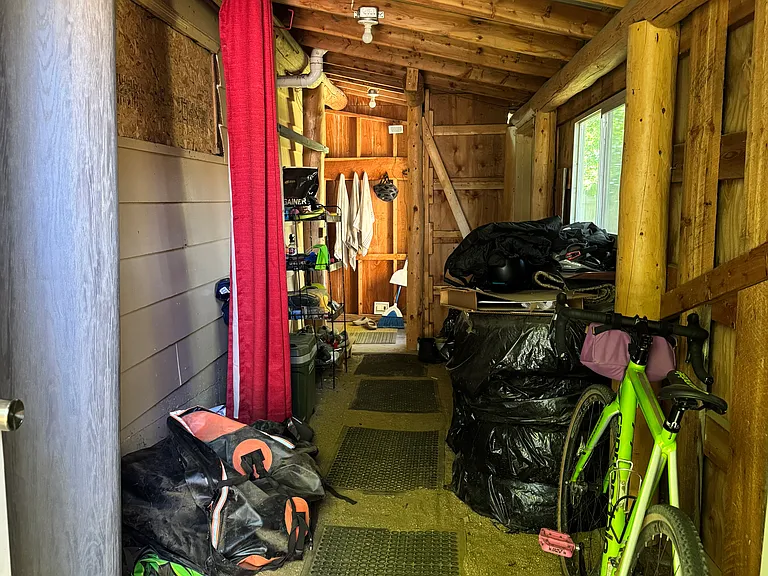 Covered storage area for bikes, skis, etc.