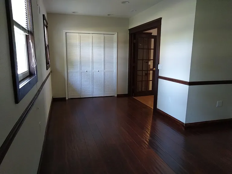 Main bedroom looking toward closet.