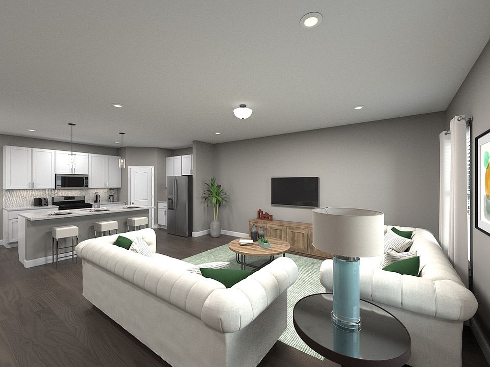 Clear sightlines allow for easy flow between the kitchen, and living areas.