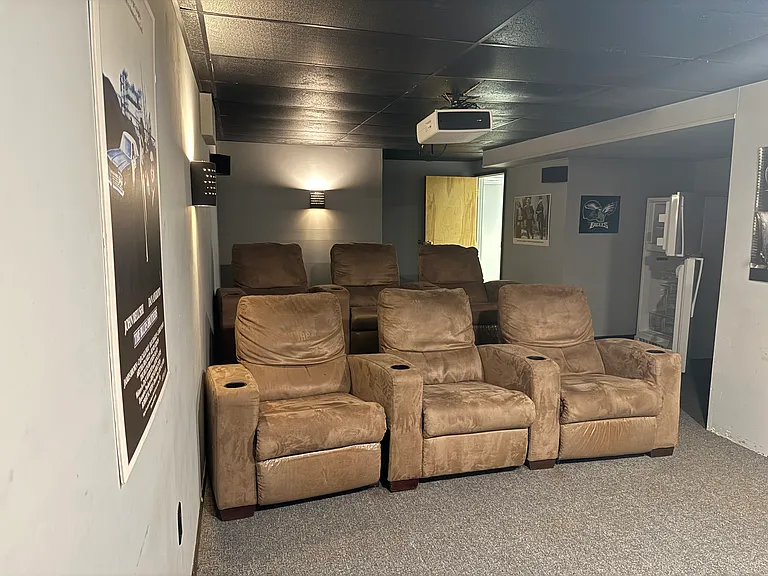 Theater room with extra refrigerator