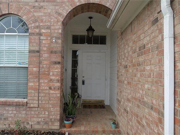 Inviting, covered entry way.
