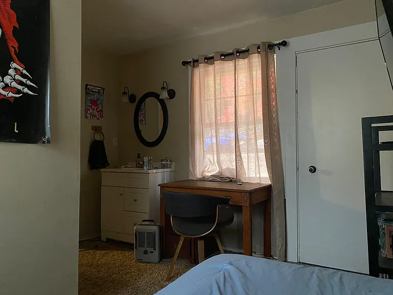 3rd bedroom, en suite bathroom and vanity. Small room but cozy with two closets