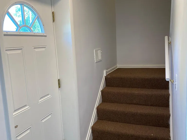 Front Interior Stairwell/Exterior Entrance