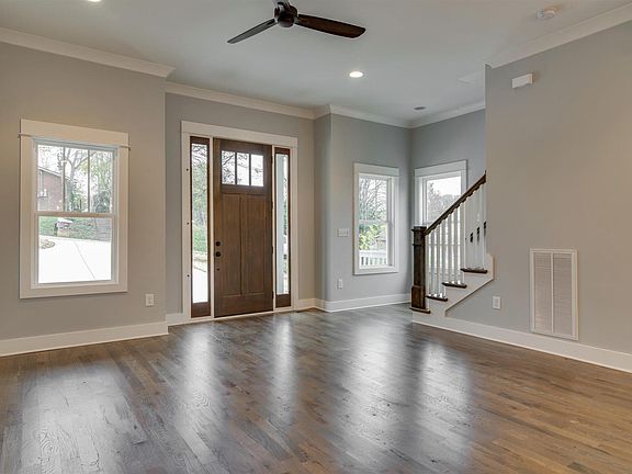 Living Room w/ 10 foot ceilings and Hardwood floors
