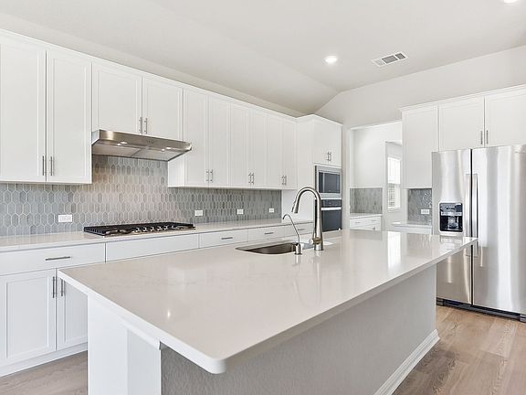 Cook a delicious meal in this beautiful kitchen.