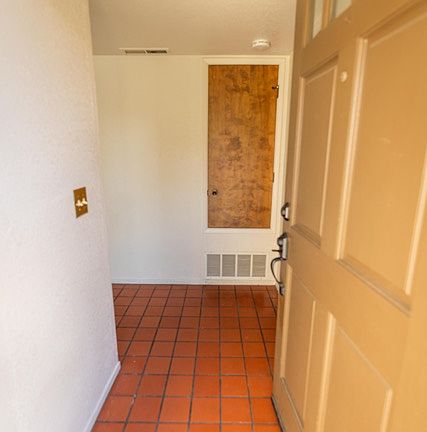 Front door
Garage to right
Living spaces to left