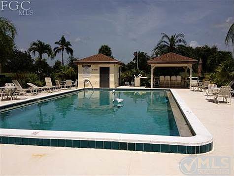 Large pool - heated - Covered bar on pool deck  BBQ grill on pool deck