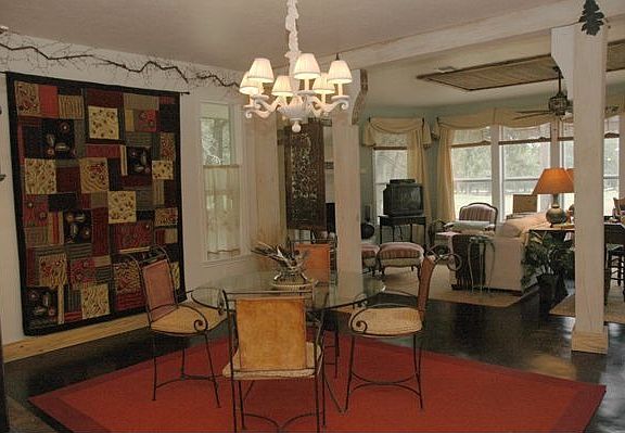 Dining room opens to living area; superb for entertaining.