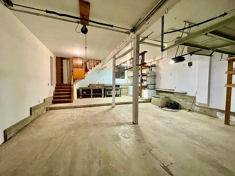 DOUBLE CAR GARAGE WITH LAUNDRY UNIT (WASHER/ DRYER)