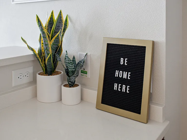 be home here sign