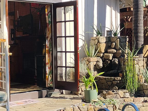 Waterfall feature outside door