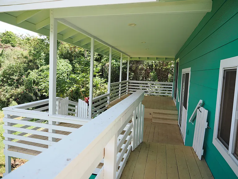 Outdoor covered lanai with access from dining and living rooms