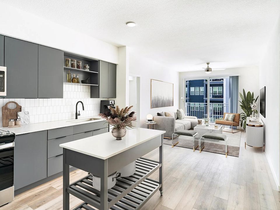 An inviting layout where the kitchen and living area connect seamlessly, offering effortless flow throughout your Modera Encore home.